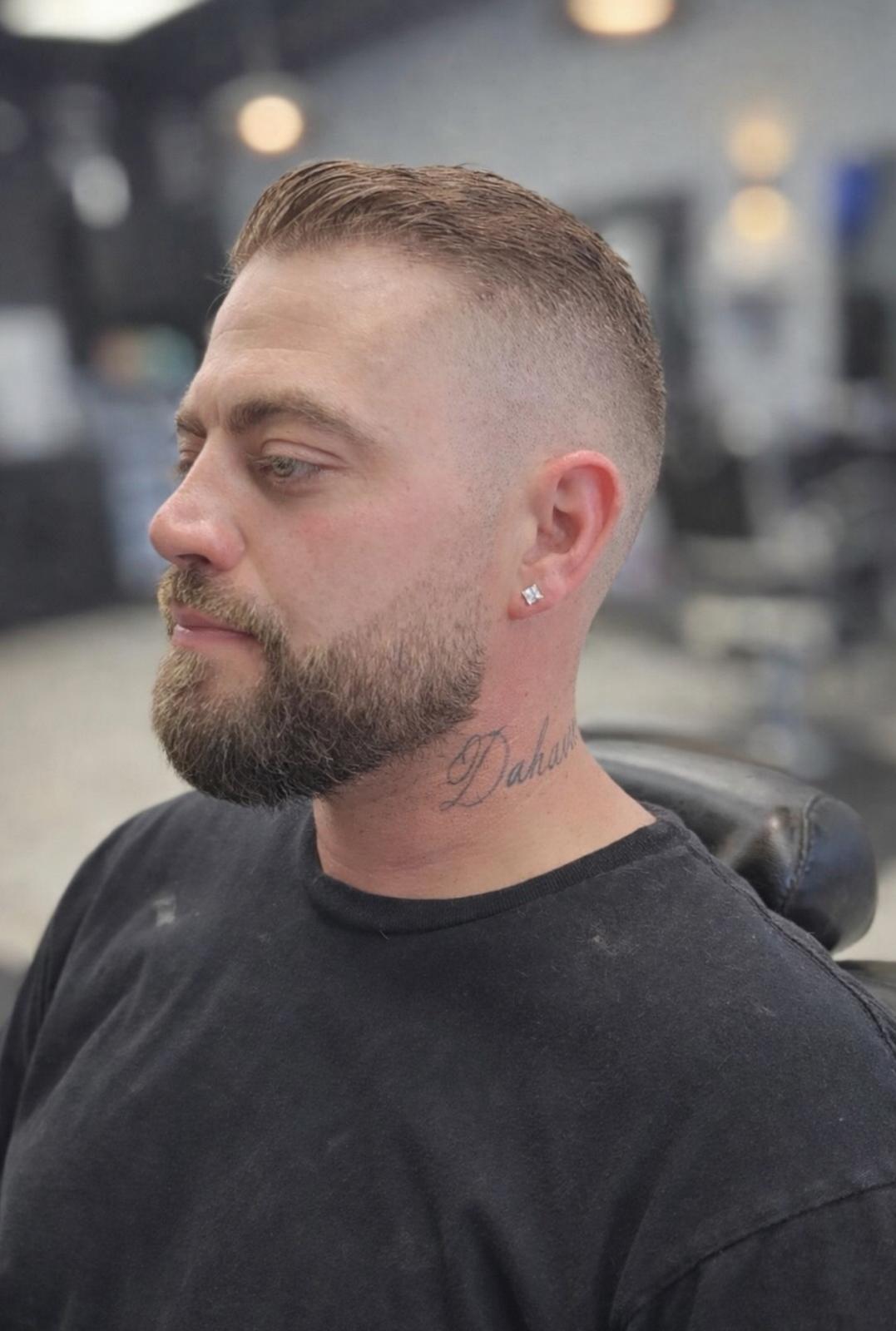 Men's haircut with sharp line-up at Fadi's Barbershop Palace