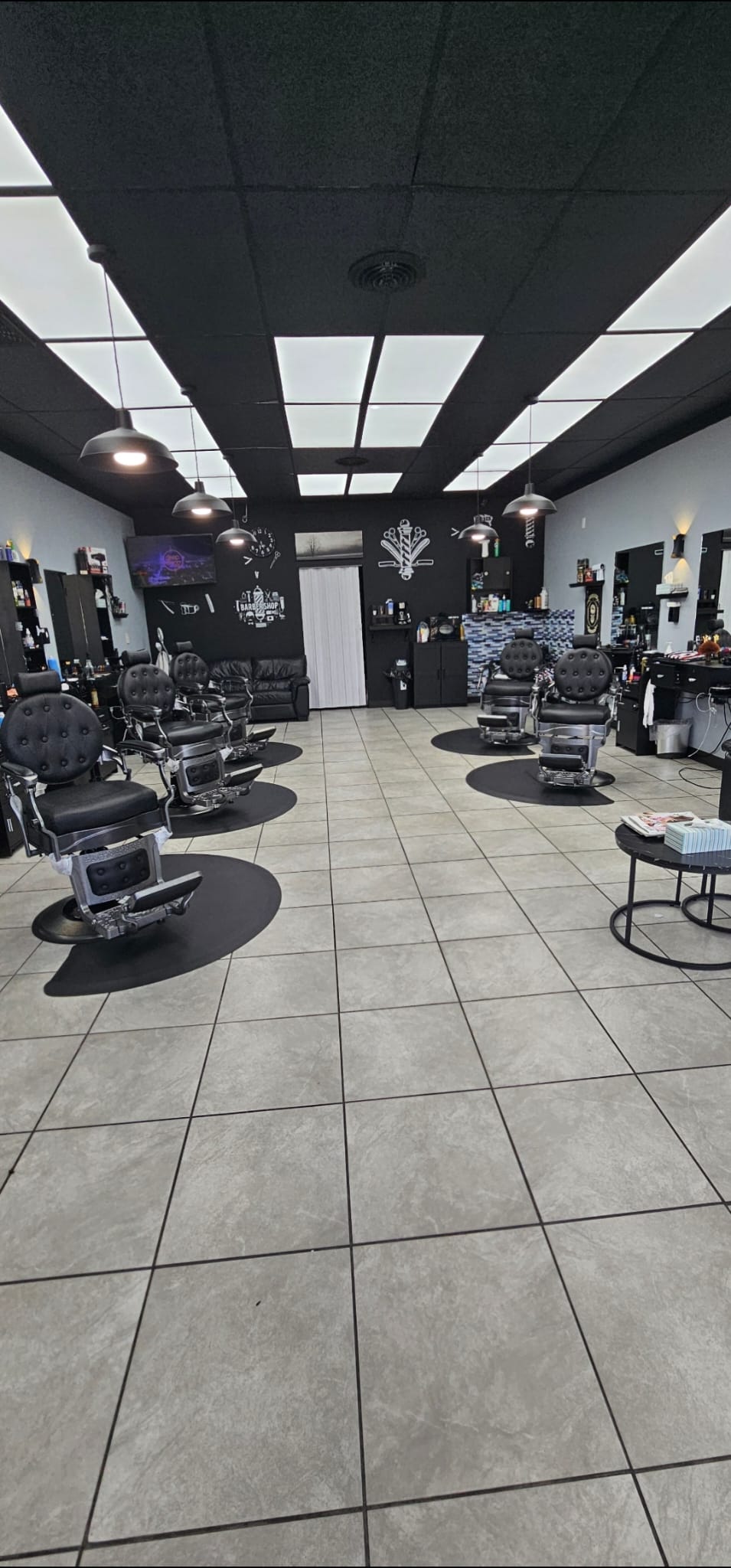 Interior of Fadi's Barbershop Palace showing barber chairs and clean workspace