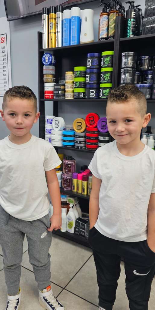 Clean fade haircut by Fadi's Barbershop Palace in Westland MI